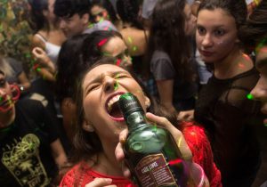 look at this teenager (we actually don't know her age) taking a shot striaght from the bottle, underage drinking has serious consequences! 